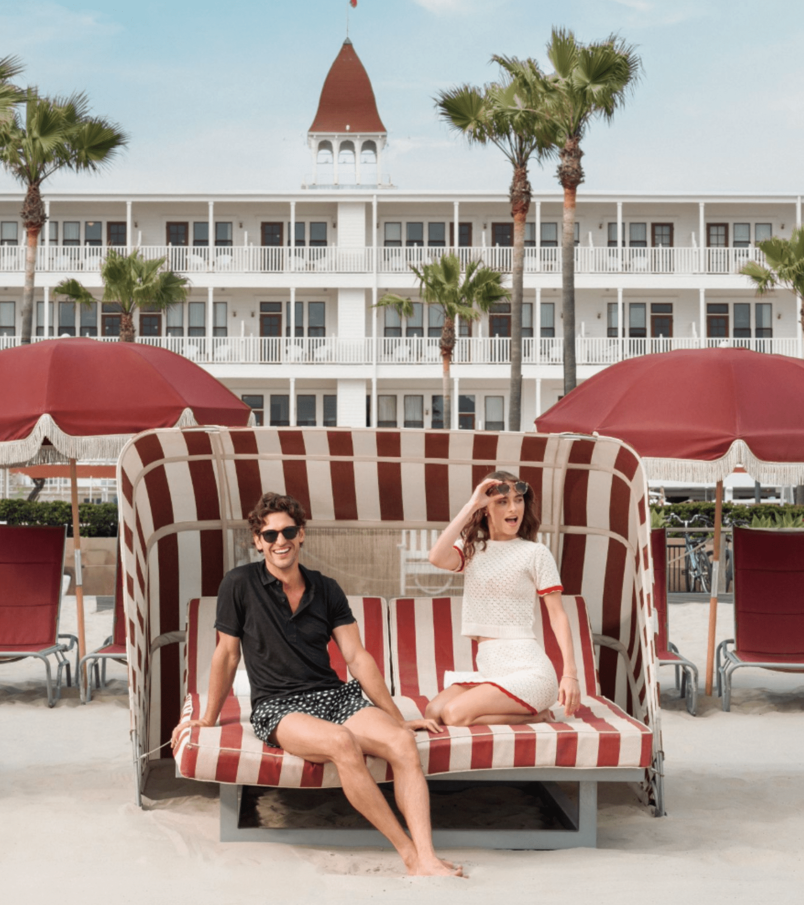 couple on beach daybed