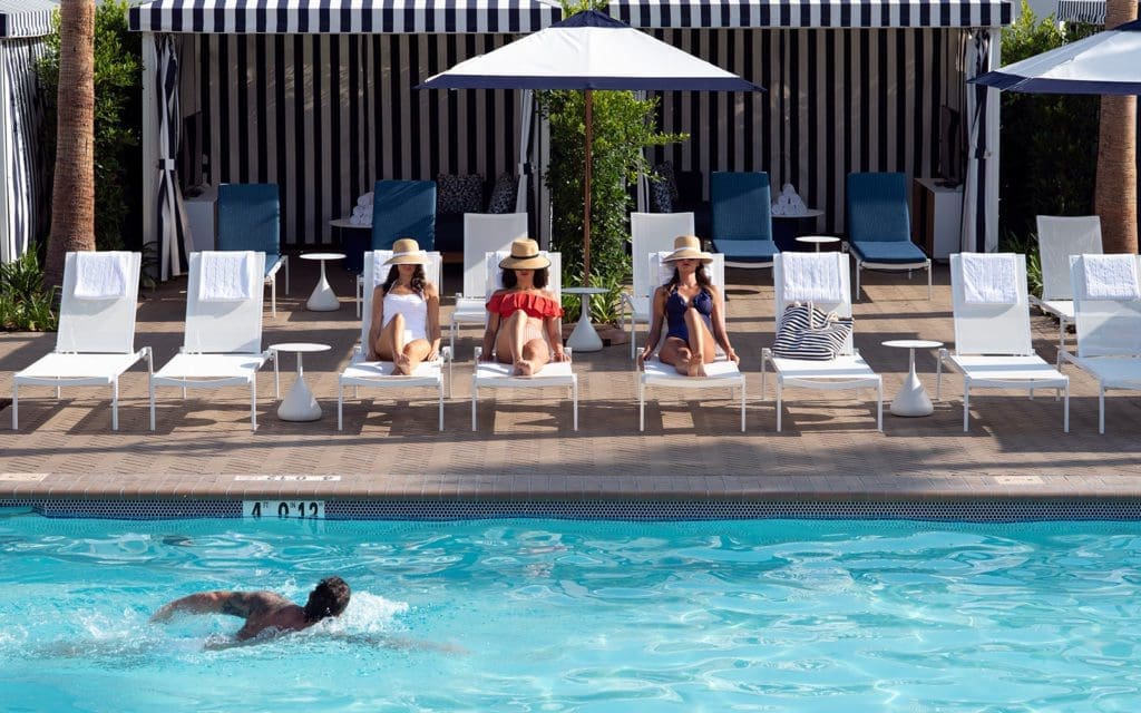 Ladies relaxing poolside
