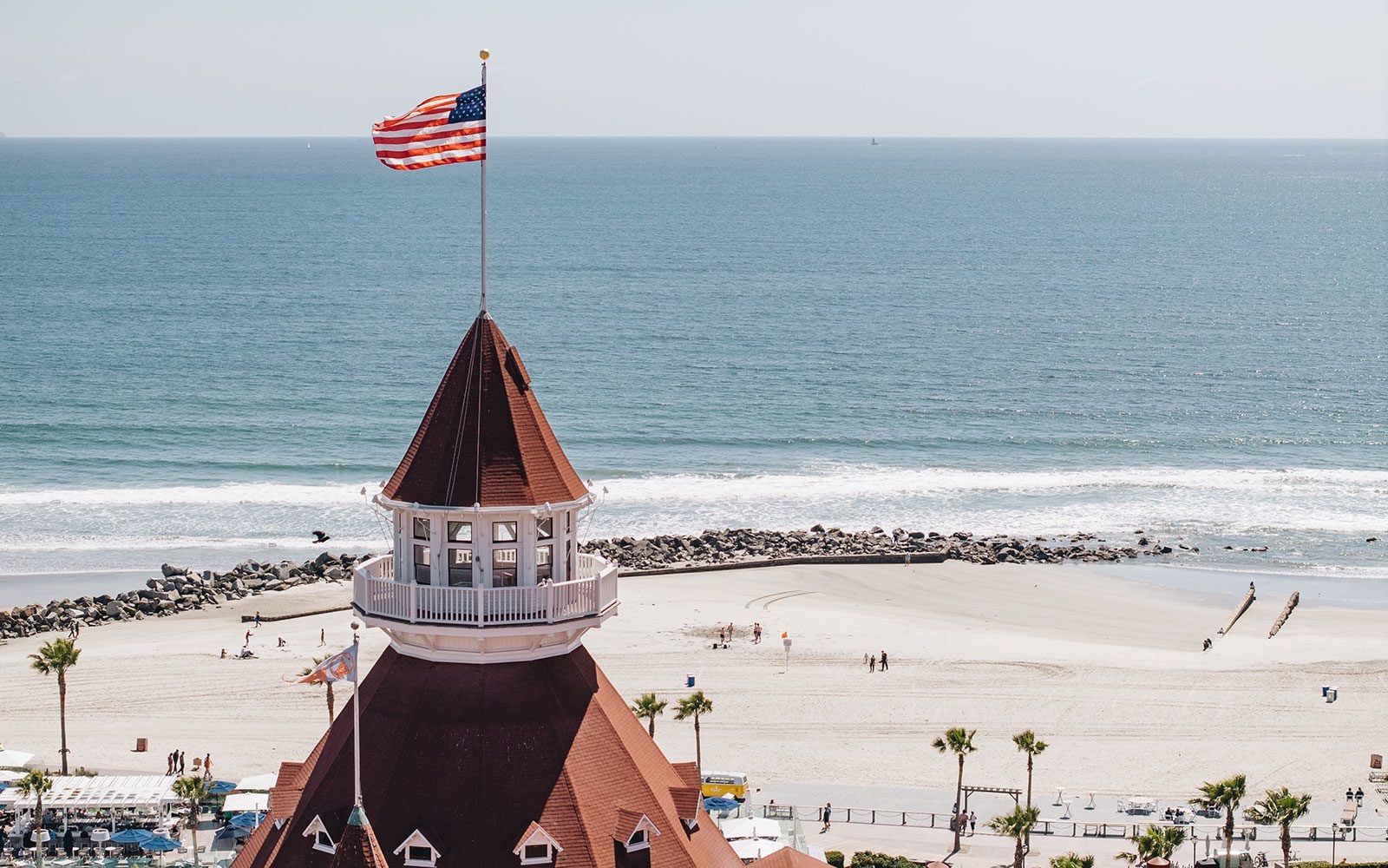 Victorian turret, American flag, and ocean